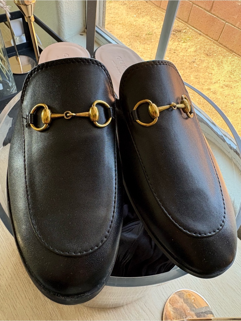 Black Leather Slip-On Loafers with Gold Bit Hardware